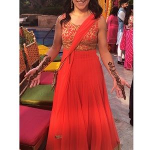 Coral and gold anarkali (Indian dress)